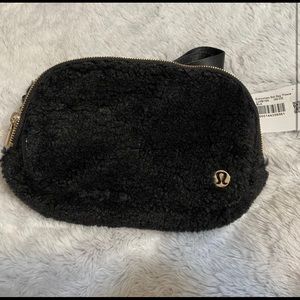 NWT lululemon black fur belt bag